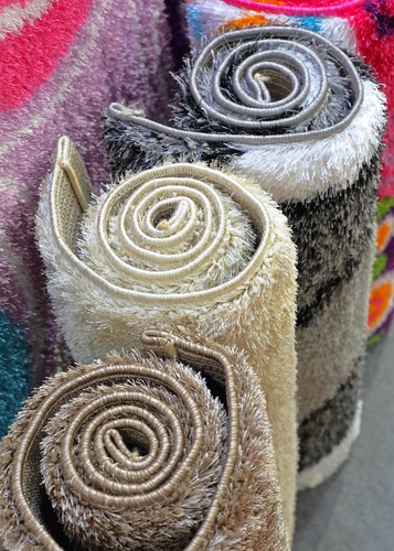 Synthetic carpets and rugs in rolls