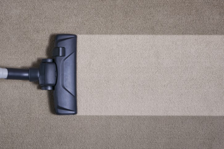 vacuuming floor